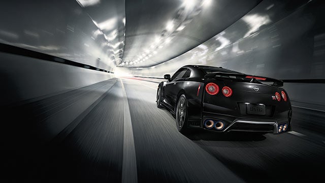 2023 Nissan GT-R seen from behind driving through a tunnel | Greenway Nissan of Florence in Florence AL